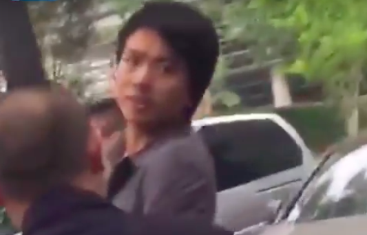 A screen shot from a video showing the violent arrest of a Now TV News cameraman.
